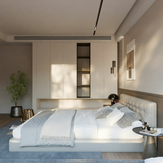 Modern bedroom with a large bed and minimalist decor.