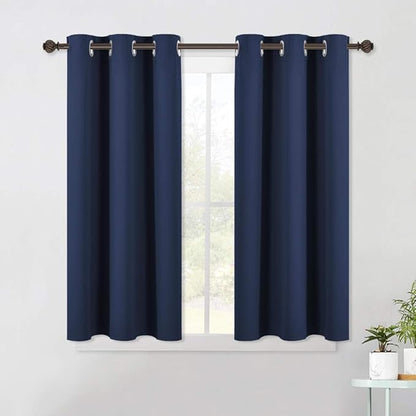 NICETOWN Blackout Draperies Curtains, All Season Thermal Insulated Solid Grommet Top Blackout Curtains/Drapes for Kid's Room (Navy, 1 Pair, 42 x 45 Inch)