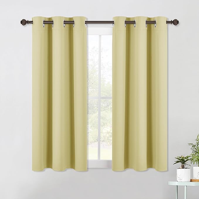 NICETOWN Blackout Window Curtains 60 inch Length 2 Panels, 34 x 60 Inch, Paler Yellow, Grommet Top Room Darkening Thermal Insulated Solid Vertical Drapes for Bedroom/Kid Room