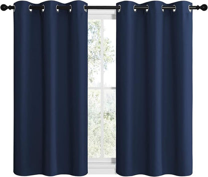 NICETOWN Blackout Draperies Curtains, All Season Thermal Insulated Solid Grommet Top Blackout Curtains/Drapes for Kid's Room (Navy, 1 Pair, 42 x 40 inches)