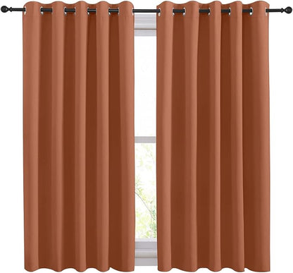NICETOWN Thermal Insulated Burnt Orange Curtains Blackout Draperies, Window Treatment Solid Grommet Room Darkening Drape Panels for Bedroom (Set of 2, 70 by 54 inches Long)