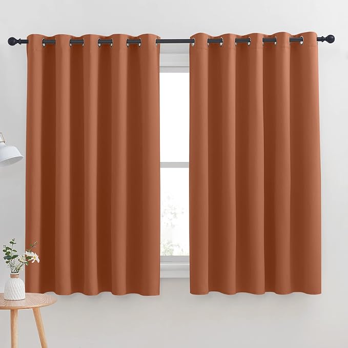 NICETOWN Thermal Insulated Burnt Orange Blackout Curtains for Bedroom, Window Treatment Solid Grommet Room Darkening Drape Panels for Bedroom (Set of 2, 70 by 63 inches Long)