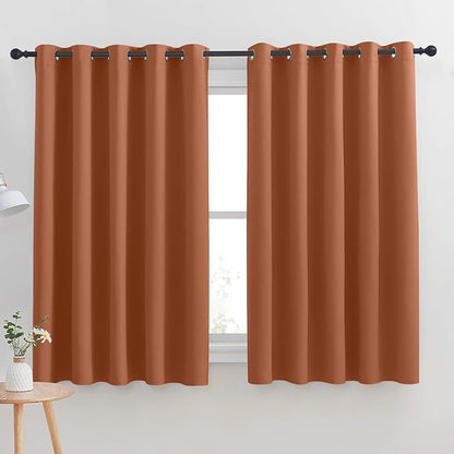 NICETOWN Thermal Insulated Burnt Orange Blackout Curtains for Bedroom, Window Treatment Solid Grommet Room Darkening Drape Panels for Bedroom (Set of 2, 70 by 63 inches Long)