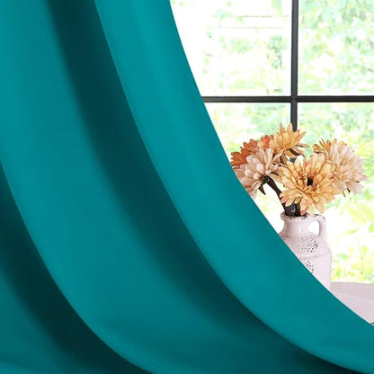 NICETOWN Thermal Insulated Peacock Teal Curtains for Living Room, Window Treatment Solid Grommet Room Darkening Drape Panels for Bedroom (Set of 2, 70 by 95 inches Long)