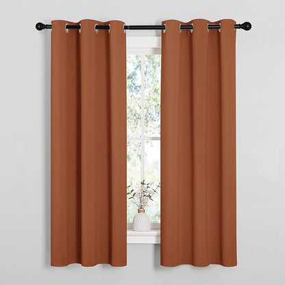 NICETOWN Blackout Curtain Panels for Girls Room, Nursery Essential Thermal Insulated Solid Grommet Top Blackout Drapes (Burnt Orange, 1 Pair, 34 x 63 Inch)