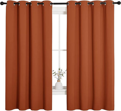 NICETOWN Blackout Curtain Panels for Girls Room, Nursery Essential Thermal Insulated Solid Grommet Top Blackout Drapes (Burnt Orange, 1 Pair, 55 x 68 inches)