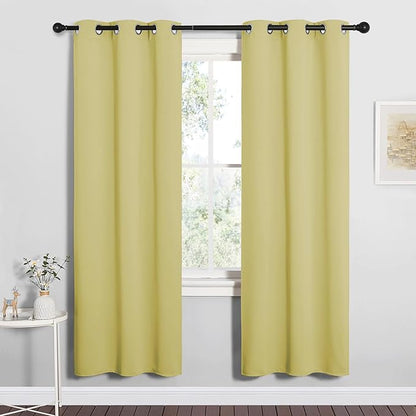 NICETOWN Bedroom Curtain Panels Blackout Draperies, Thermal Insulated Solid Grommet Blackout Curtains/Drapes (Paler Yellow, 1 Pair, 34 by 72-inch)