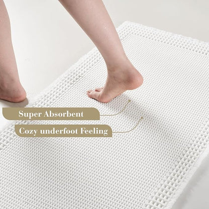 RESARE Waffle Bath Mat for Bathroom, Super Absorbent Bathroom Rugs Non Slip Machine Washable, Ultra Soft Quick Dry Boho Bath Rugs with Tassels for Floor, Upgraded Bordered Design, 18"x30" White