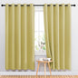 NICETOWN Room Darkening Curtain Panels 72 - Window Treatment Energy Saving Thermal Insulated Solid Grommet Room Darkening Drapes for Living Room (Paler Yellow, 1 Pair, 66 by 72-Inch)