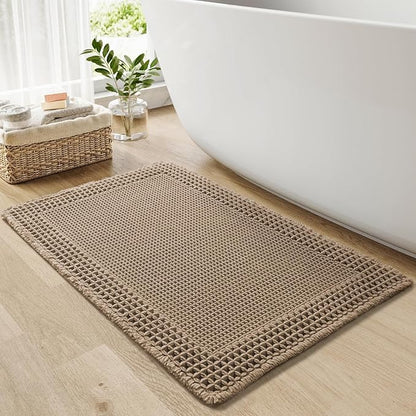 RESARE Waffle Bath Mat for Bathroom, Super Absorbent Bathroom Rugs Non Slip Machine Washable, Ultra Soft Quick Dry Boho Bath Rugs with Tassels for Floor, Upgraded Bordered Design, 18"x30" Brown