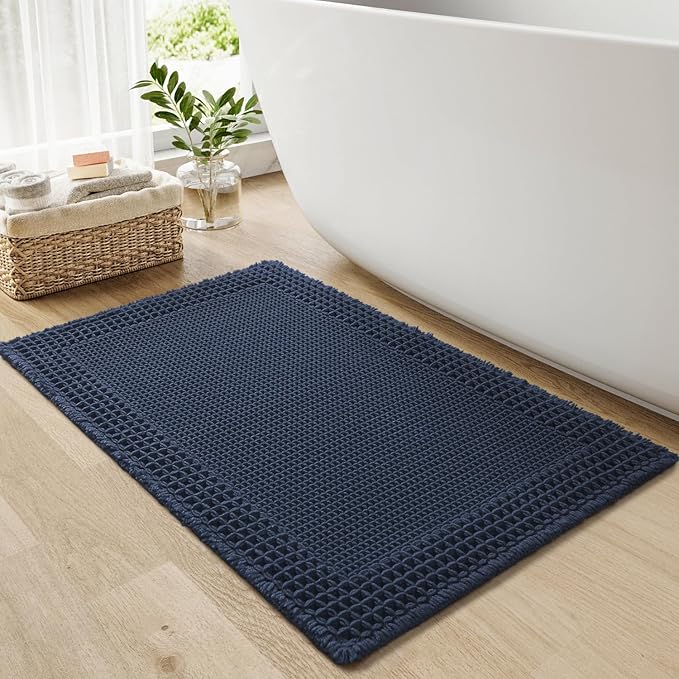 RESARE Waffle Bath Mat for Bathroom, Super Absorbent Bathroom Rugs Non Slip Machine Washable, Ultra Soft Quick Dry Boho Bath Rugs with Tassels for Floor, Upgraded Bordered Design, 24"x36" Navy