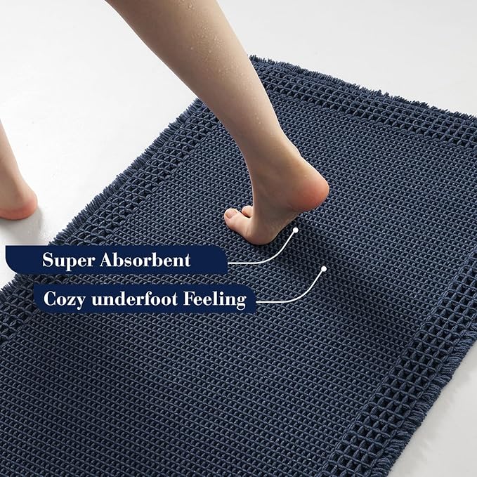 RESARE Waffle Bath Mat for Bathroom, Super Absorbent Bathroom Rugs Non Slip Machine Washable, Ultra Soft Quick Dry Boho Bath Rugs with Tassels for Floor, Upgraded Bordered Design, 24"x36" Navy