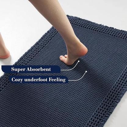RESARE Waffle Bath Mat for Bathroom, Super Absorbent Bathroom Rugs Non Slip Machine Washable, Ultra Soft Quick Dry Boho Bath Rugs with Tassels for Floor, Upgraded Bordered Design, 24"x36" Navy